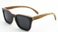 Gafas de sol de madera natural y évano.
